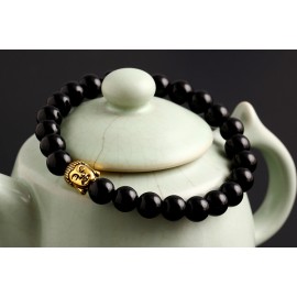 bracelet perles noires "bouddha doré"